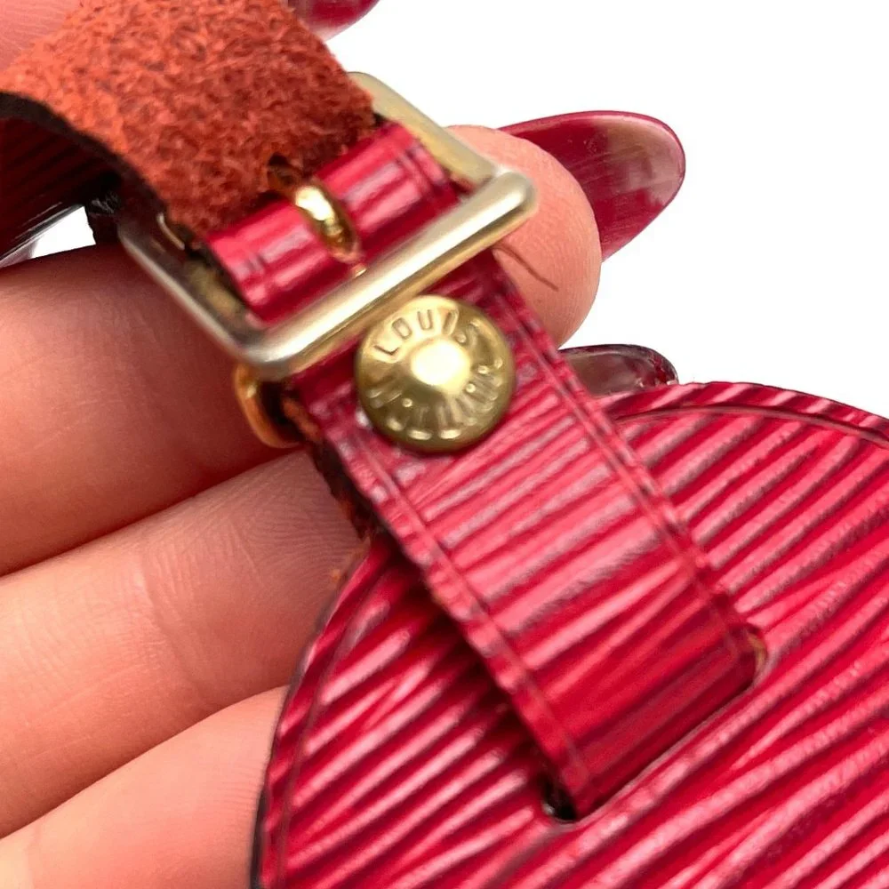 Rare Louis Vuitton red Epi leather luggage tag and poignet set